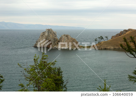 Shore of Lake Baikal. Olkhon Island, Shaman Rock 106640059
