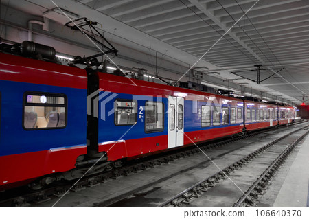 Passenger train at platform Passenger train at platform 106640370