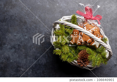 Basket with Christmas gingerbread cookies 106640901