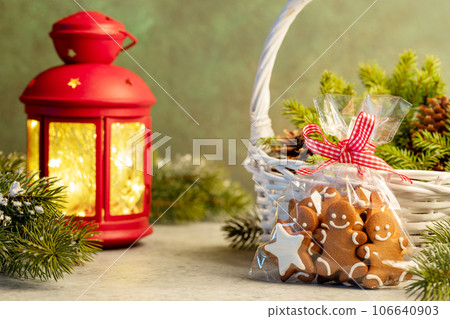 Christmas gingerbread cookies and garland lights Christmas gingerbread cookies and garland lights 106640903