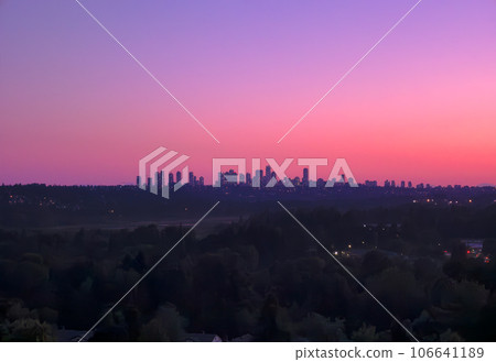 Urban cityscape on lilac sunset sky background 106641189