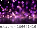 Creative background with blurred purple bokeh on black background 106641416