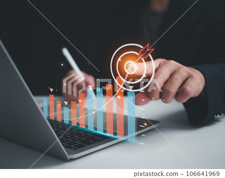Businessman pointing to the target. Business concept. management concept business planning concept 106641969