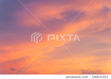 Sunset sky dyed orange 106642401
