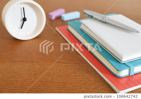 Clock and notebook study image Clock and notebook study image 106642742