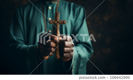 Christianity hands holding religious cross. Pray to god. Person praying in church concept. religion,spirituality,religious,believe,faith,hope,worship.Hand holding religious crucifix cross. Christian 106642900