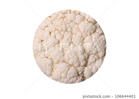 Beautiful swing of fresh white cauliflower on a dark concrete background Beautiful swing of fresh white cauliflower on a dark concrete background 106644401