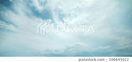 Light blue sky with white clouds Light blue sky with white clouds 106645022