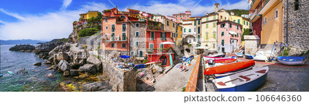 Italy, Liguria. Scenic colorful traditional village Tellaro with old fishing boats. la Spezia province Italy, Liguria. Scenic colorful traditional village Tellaro with old fishing boats. la Spezia province 106646360