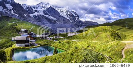 amazing Swiss nature . Kleine Scheidegg mountain pass that runs between the famous Eiger and the Lauberhorn famous for hiking in Bernese Alps. Switzerland travel 106646489