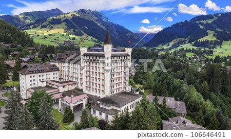 Gstaad - elegant and popular mountain ski resort in Swizerland, canton Bern. aerial drone panoramic view 106646491