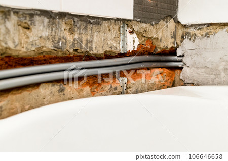 flexible plumbing pipe are routed in chiseled wall flexible plumbing pipe are routed in chiseled wall 106646658