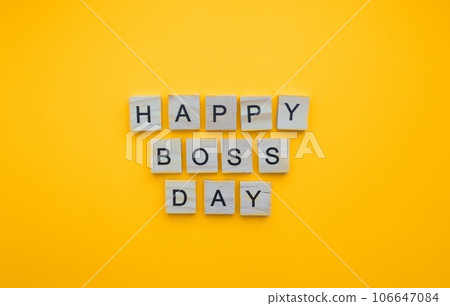 October 16, National Boss Day, minimalistic banner with the inscription in wooden letters on an orange background October 16, National Boss Day, minimalistic banner with the inscription in wooden letters on an orange background 106647084