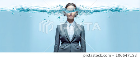 portrait of young attractive business woman in suit submerged in water, banner 106647158
