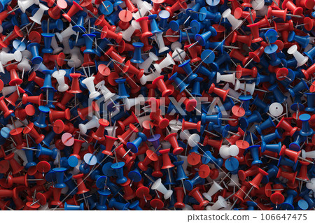 several assorted colors of plastic push pins 106647475