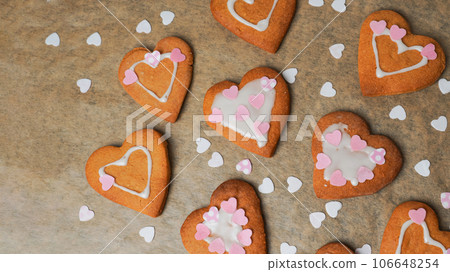 Heart cookies on baker's paper. Mothers day celebration. Home baking. Valentines Day 106648254