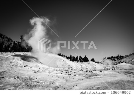 Steam vapor cloud rising from an open pool at Bumpass Hell hydrothermal area at Lassen Volcanic National Park, California, USA 106649902
