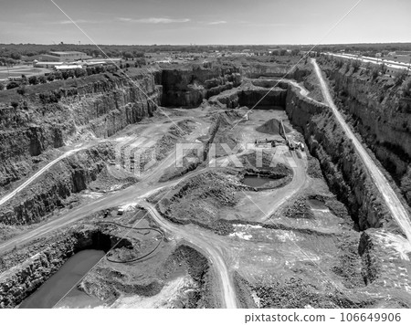 Open pit view of a quartzite rock quarry in Sioux Falls, South Dakota Open pit view of a quartzite rock quarry in Sioux Falls, South Dakota 106649906