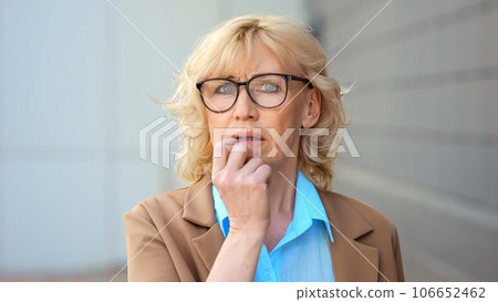 Female blonde entrepreneur worries about deal with client Female blonde entrepreneur worries about deal with client 106652462