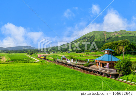 With the Aso mountain range in the background, the Sunny Train and Minami Aso Water Village Hakusui Kogen Station "Minami Aso Railway All Lines Open" 106652642