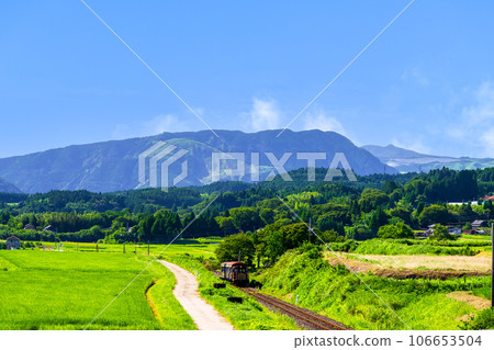 Sightseeing train with the mountain range of Aso in the background Torokko train Minami Aso water birth village Hakusui Kogen station "Minami Aso railway full line opening" 106653504