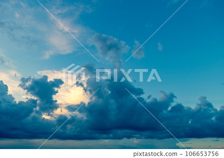 Black clouds rising in the summer blue sky a-4 warm colors and cold colors emphasized Black clouds rising in the summer blue sky a-4 warm colors and cold colors emphasized 106653756