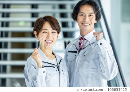 Male and female business people in work clothes 106655415