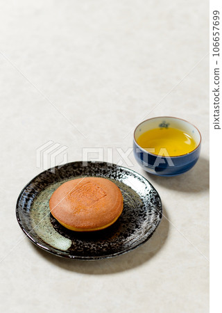 Japanese confectionery Dorayaki A delicious Japanese confectionery with plenty of bean paste in between the moist and fluffy dough Japanese confectionery Dorayaki A delicious Japanese confectionery with plenty of bean paste in between the moist and fluffy dough 106657699