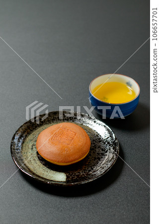 Japanese confectionery Dorayaki A delicious Japanese confectionery with plenty of bean paste in between the moist and fluffy dough Japanese confectionery Dorayaki A delicious Japanese confectionery with plenty of bean paste in between the moist and fluffy dough 106657701