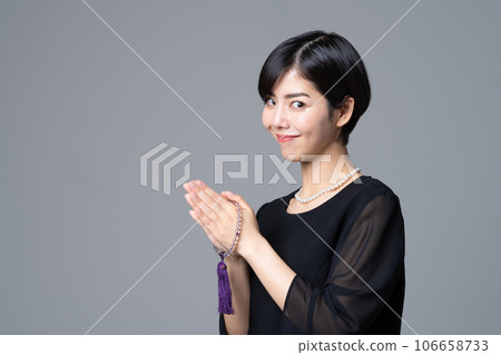 young woman in mourning clothes young woman in mourning clothes 106658733