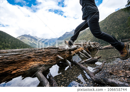 Jumping on to a one-plank bridge Jumping on to a one-plank bridge 106658744
