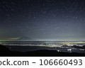 Mt. Fuji, starry sky, and lights from the Izu Daruma Mountain Plateau 106660493