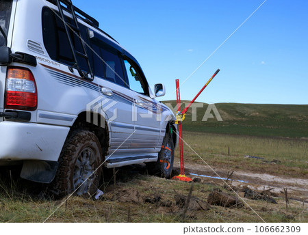 Offroad car got stuck in the mud Offroad car got stuck in the mud 106662309