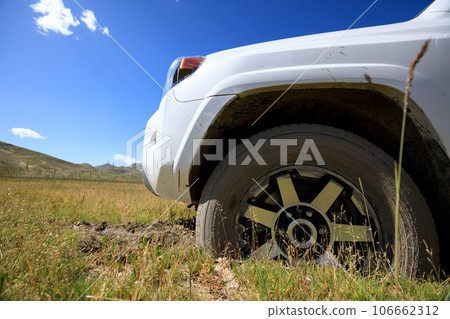 Offroad car got stuck in the mud Offroad car got stuck in the mud 106662312