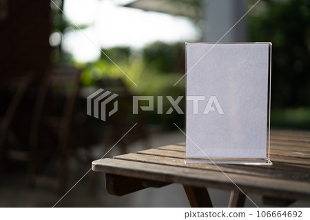 Stand Mock up Menu frame tent card blurred background design key visual layout. Stand Mock up Menu frame tent card blurred background design key visual layout. 106664692