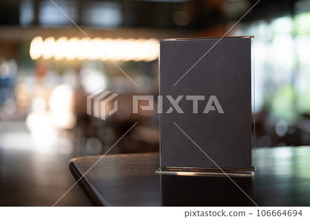 Stand Mock up Menu frame tent card blurred background design key visual layout. Stand Mock up Menu frame tent card blurred background design key visual layout. 106664694