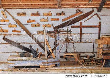 Authentic tools in the house in the rustic style. Installation in museums of traditional rural household items. 106666043