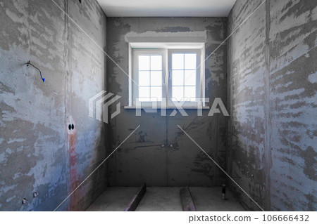 A room in a house under construction.  106666432