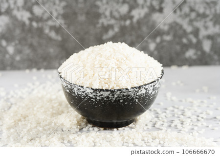 Rice in a bowl, illuminated by sunlight. 106666670