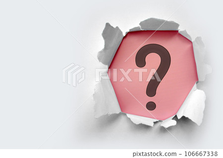 Torn out white paper with question mark symbol. White torn paper revealing question mark symbol on Pink paper. Torn out white paper with question mark symbol. White torn paper revealing question mark symbol on Pink paper. 106667338