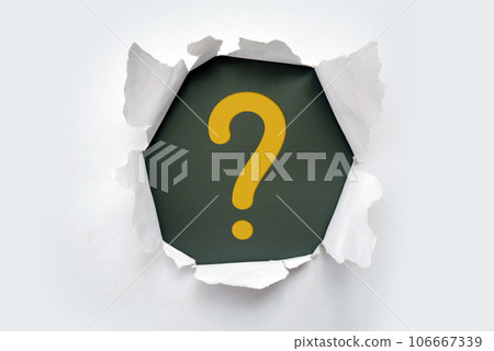 Torn out white paper with question mark symbol. White torn paper revealing question mark symbol on Pink paper. Torn out white paper with question mark symbol. White torn paper revealing question mark symbol on Pink paper. 106667339