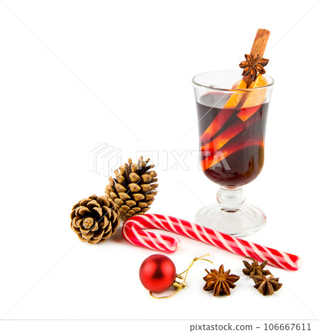 Mulled wine and Christmas decoration isolated on white background. Free space for text. Mulled wine and Christmas decoration isolated on white background. Free space for text. 106667611
