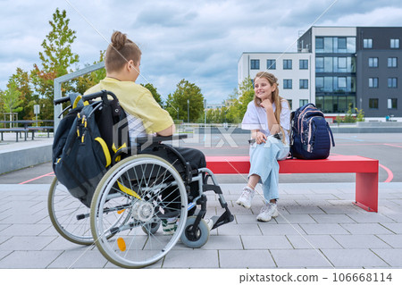 Friendship communication of children of boy in wheelchair and girl 106668114