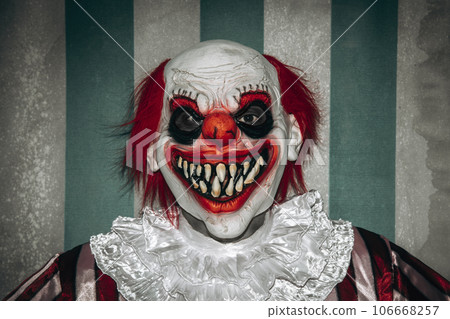 mad evil redhead clown in the circus 106668257