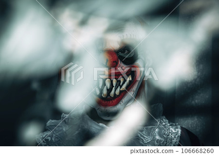 mad evil clown stares at the observer mad evil clown stares at the observer 106668260