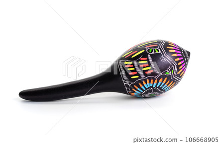 Painted maracas lying on white 106668905