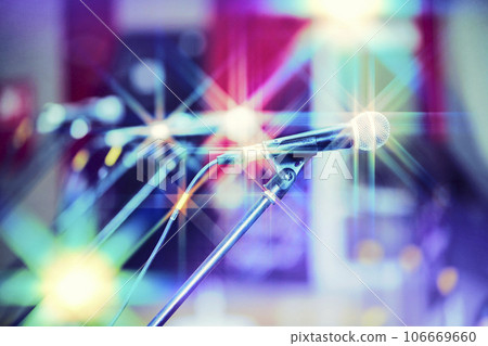 Vintage colorful background with microphones and stage lights. Vintage colorful background with microphones and stage lights. 106669660