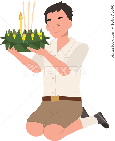 Loy Krathong Traditional Festival. Thai Student boy is sitting and hold krathong up to make a wish before float in river. 106671060