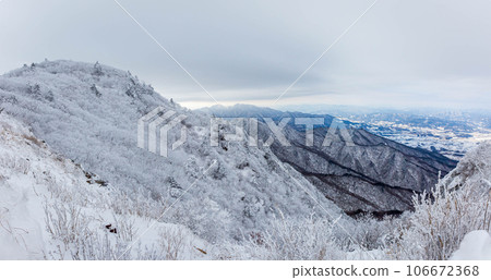 Snow-capped Deogyusan mountains on a clear day in winter, South Korea. Snow-capped Deogyusan mountains on a clear day in winter, South Korea. 106672368