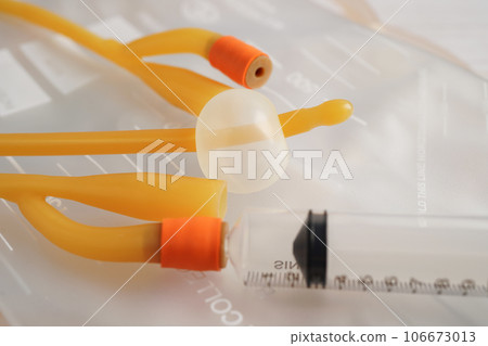 Foley catheter and urine drainage bag collect urine for disability or patient in hospital. 106673013